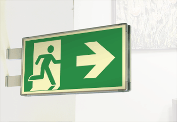 SEMLE715102BN - Segnaletica all. Metal bifacciale luminescente uscita Dx EN ISO 7010