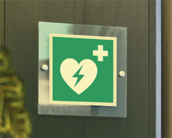 [SEPSE15156W] SEPSE15156W - targa Plexi monofacciale Defibrillatore EN ISO 7010 E010